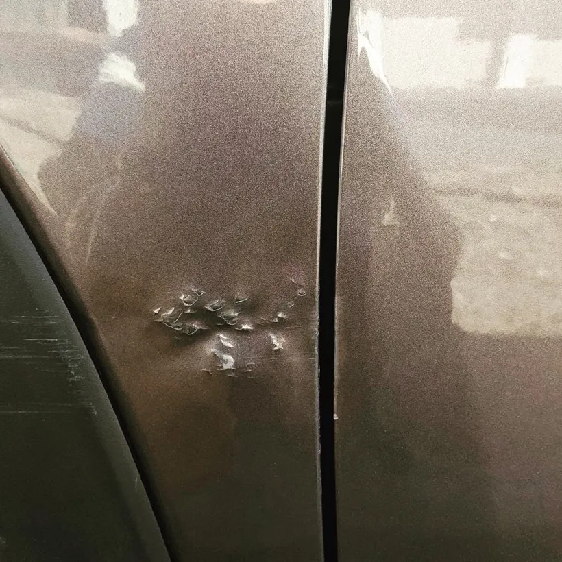 Example of a bad paintless dent repair 12