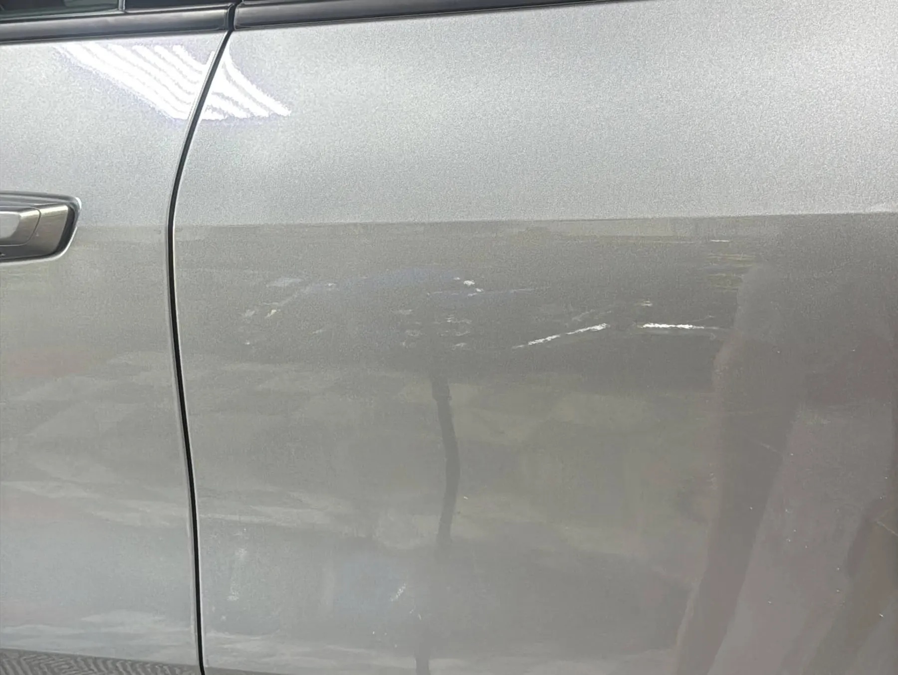 Chevy Traverse driver door after paintless dent repair