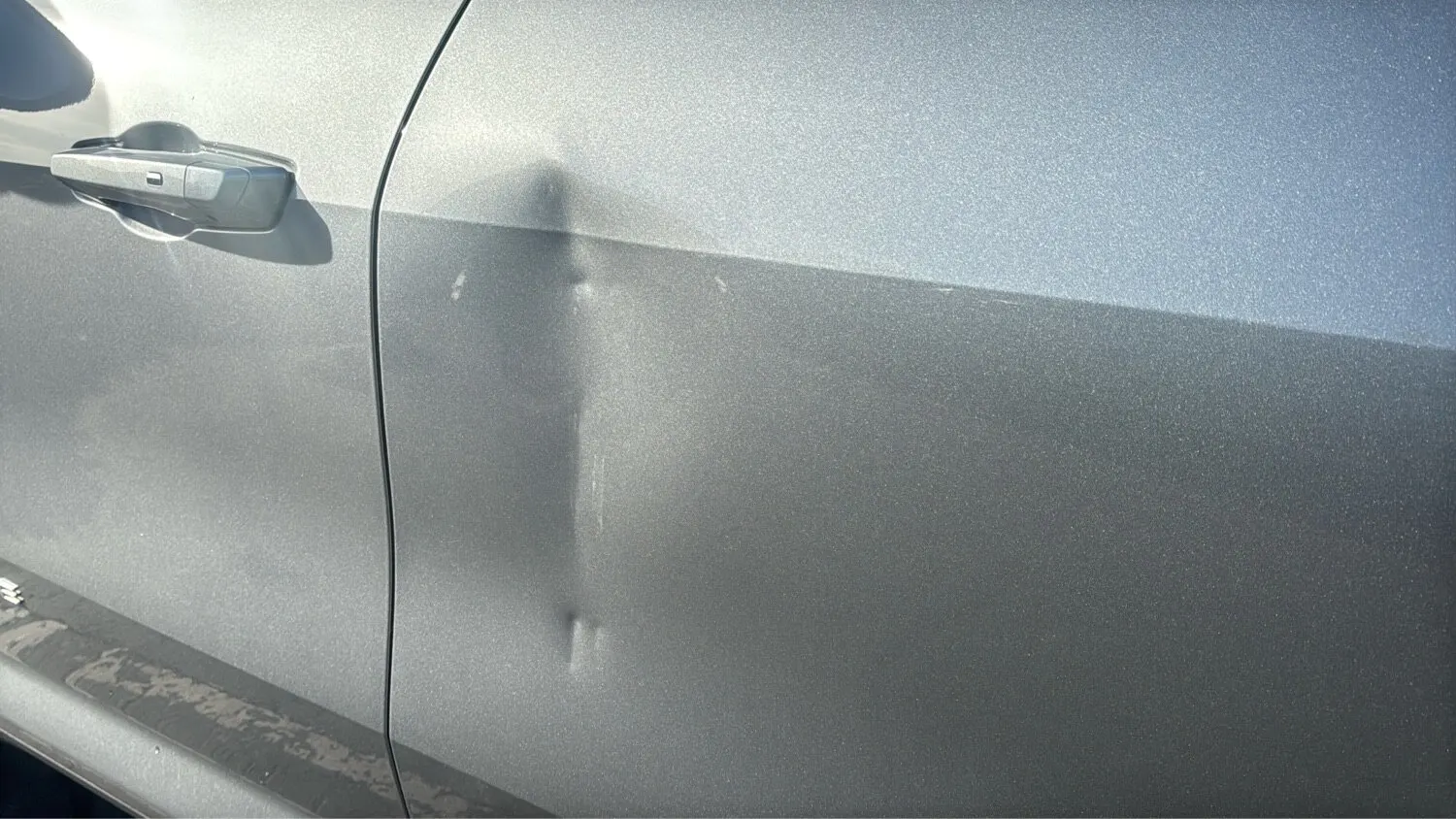 Chevy Traverse driver door before repair