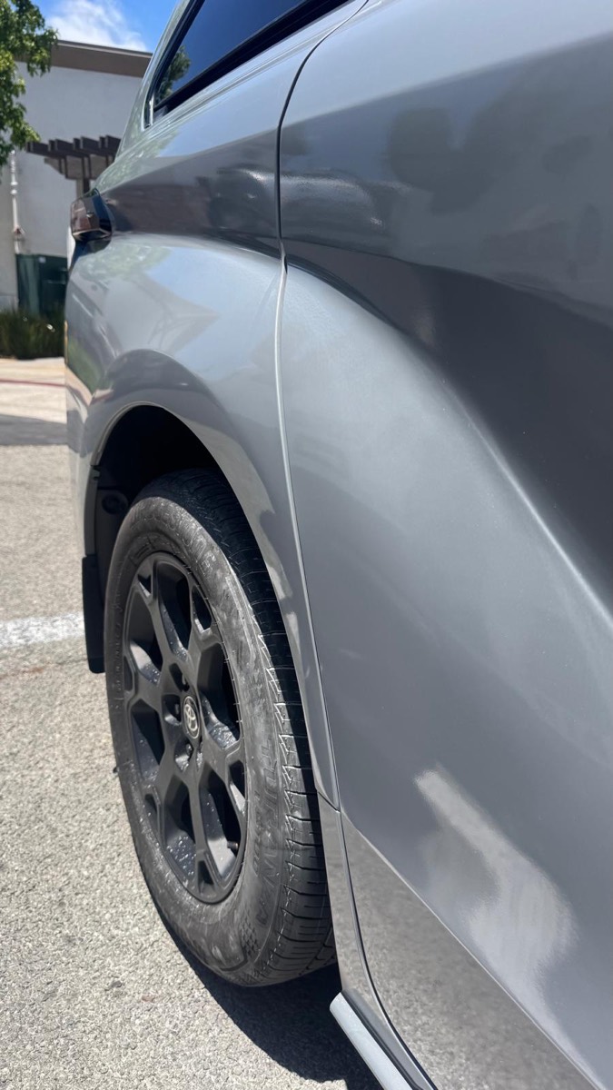 The same gray Toyota rear quarter panel after mobile scratch and paint repair in San Diego
